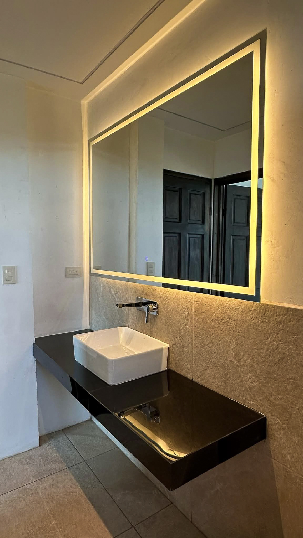 El viajero Acabados Baño